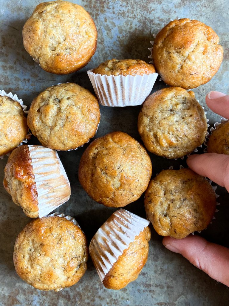 banana mini muffins on a gray pan